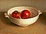 Still life with tomatoes in bowl